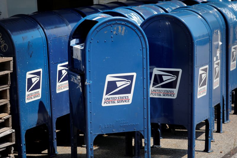 United States Postal Service (USPS) mailboxes are seen stored outside