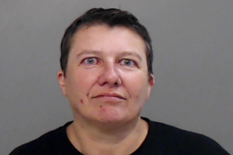 Pascale Ferrier appears in a jail booking photograph taken after