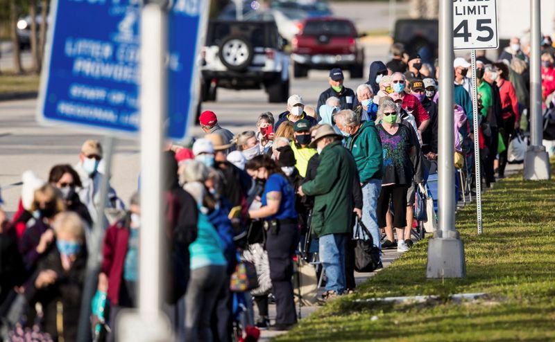 Hundreds wait in line at Lakes Park Regional Library to