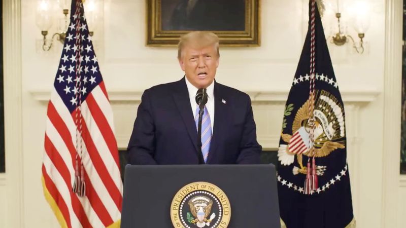 U.S President Donald Trump gives an address a day after