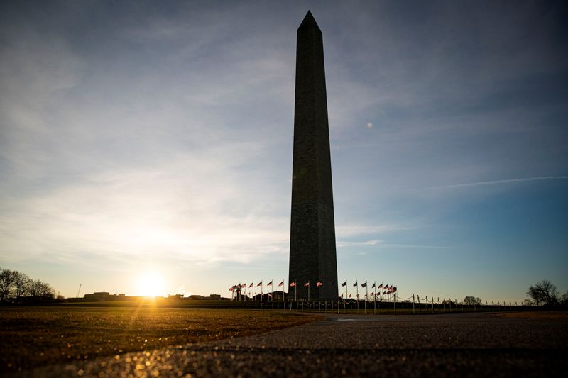 FILE PHOTO: The Washington Monument is pictured as the sun