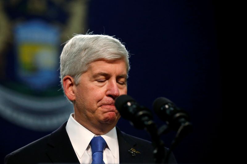 FILE PHOTO: Michigan Governor Rick Snyder pauses as he speaks