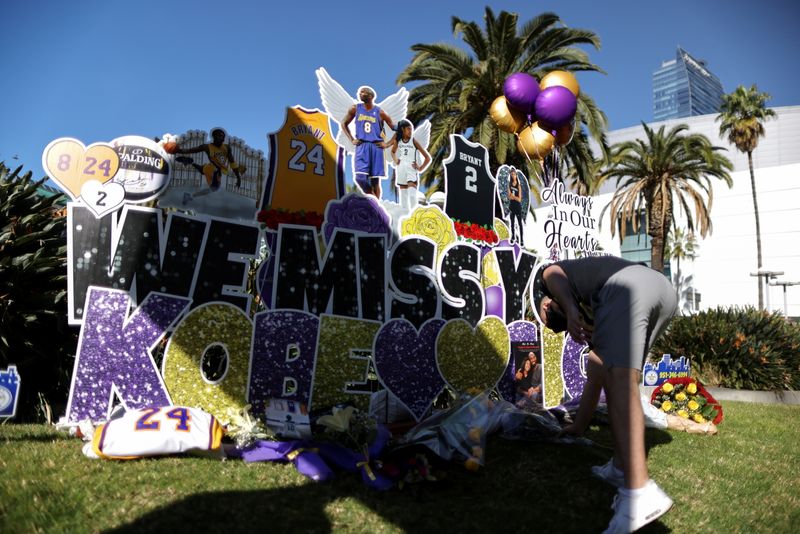 Kobe Bryant’s fans gather at a memorial outside the Staples