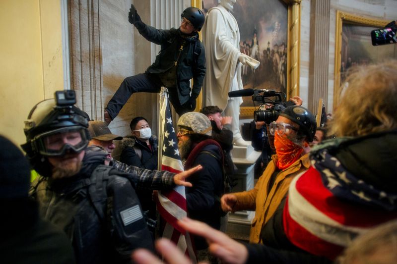 FILE PHOTO: Trump supporters breach the U.S. Capitol