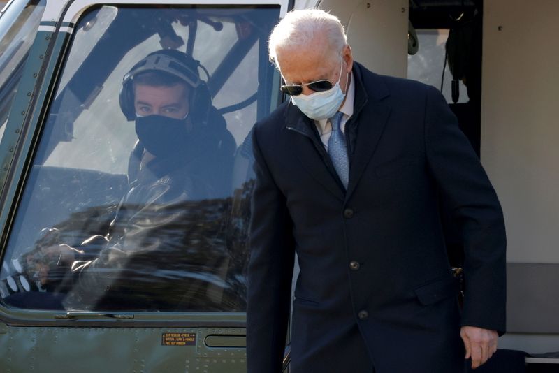 Biden steps off Marine One in Washington