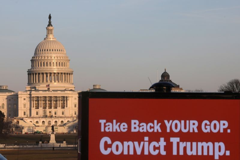 Trucks advertising in support of convicting former U.S President Donald