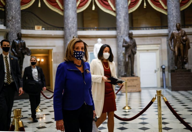 U.S. House Speaker Nancy Pelosi walks through Statuary Hall on