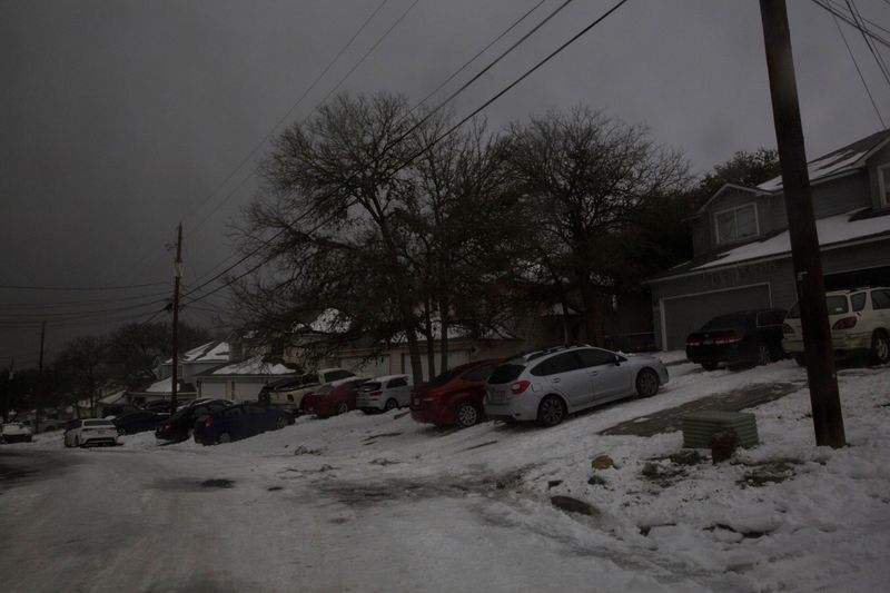 FILE PHOTO: A neighborhood experiences a power outage after winter