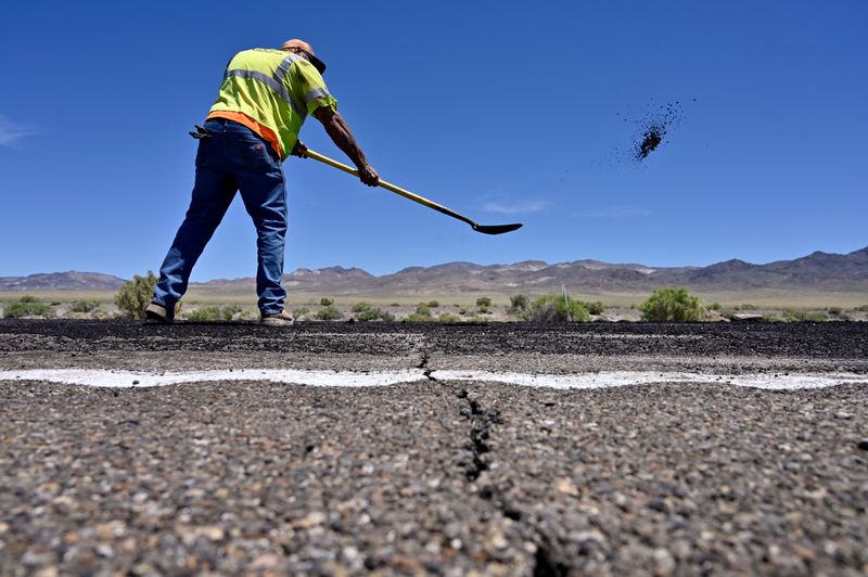 FILE PHOTO: A crack across the roadway is seen as