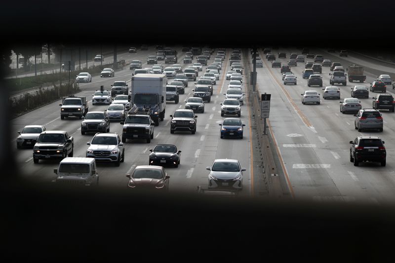 Morning traffic drives on the 405 freeway in Los Angeles