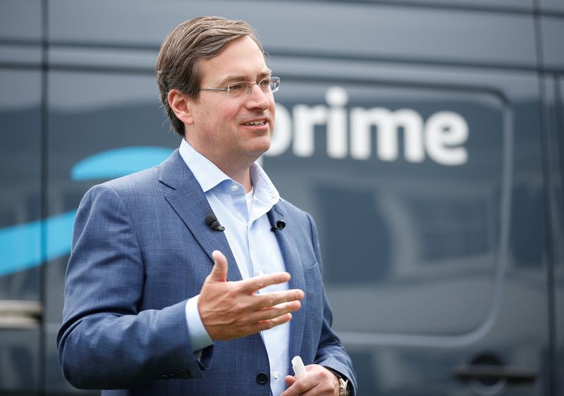 Amazon SVP of worldwide operations Clark speaks during a press