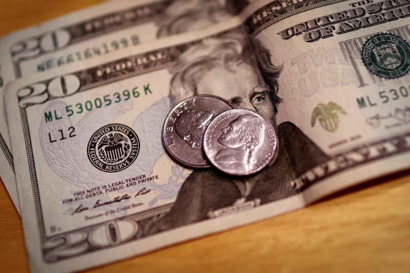 FILE PHOTO: U.S. currency is seen in this picture illustration