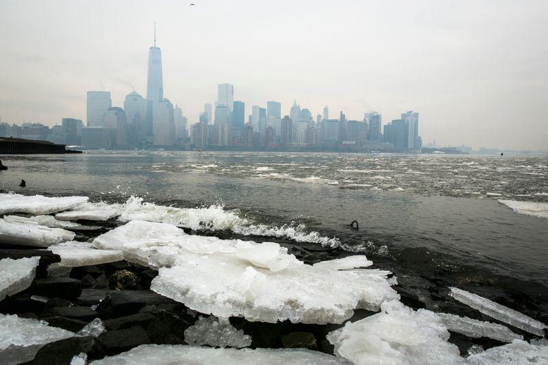 FILE PHOTO: Ice lines the shoreline of the Hudson River