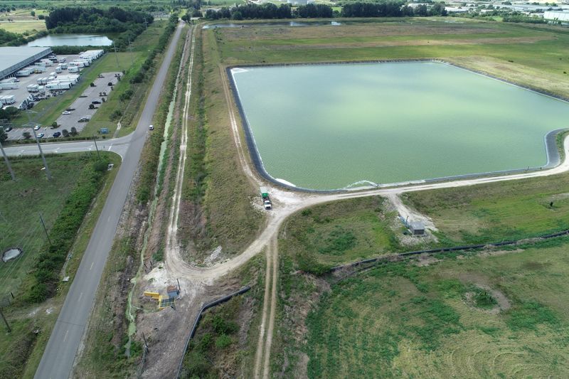 A reservoir of an old phosphate plant is seen in