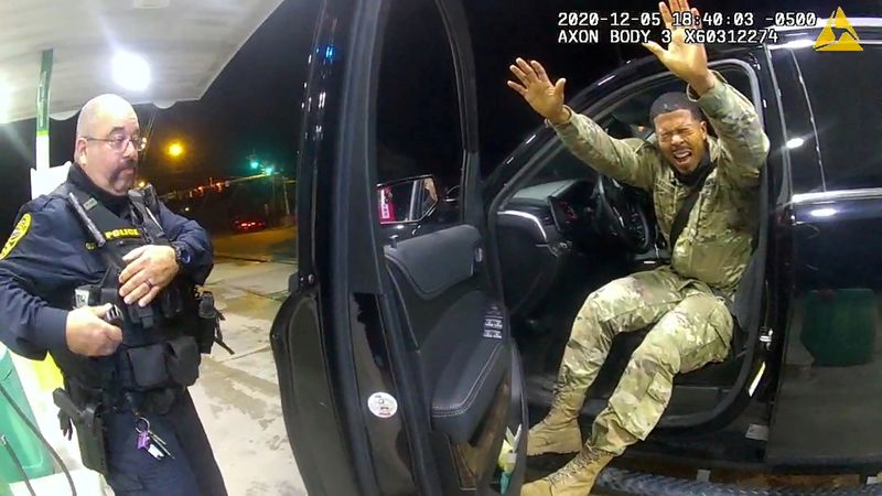 U.S. Army 2nd Lieutenant Caron Nazario exits after being sprayed