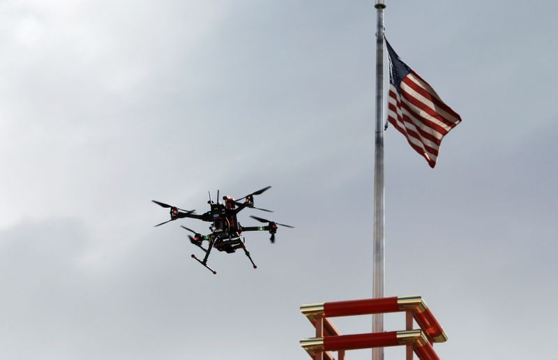 FILE PHOTO: A drone flies over downtown during a NASA