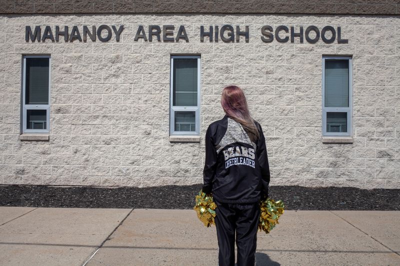 Levy, a former cheerleader at Mahanoy Area High School, poses