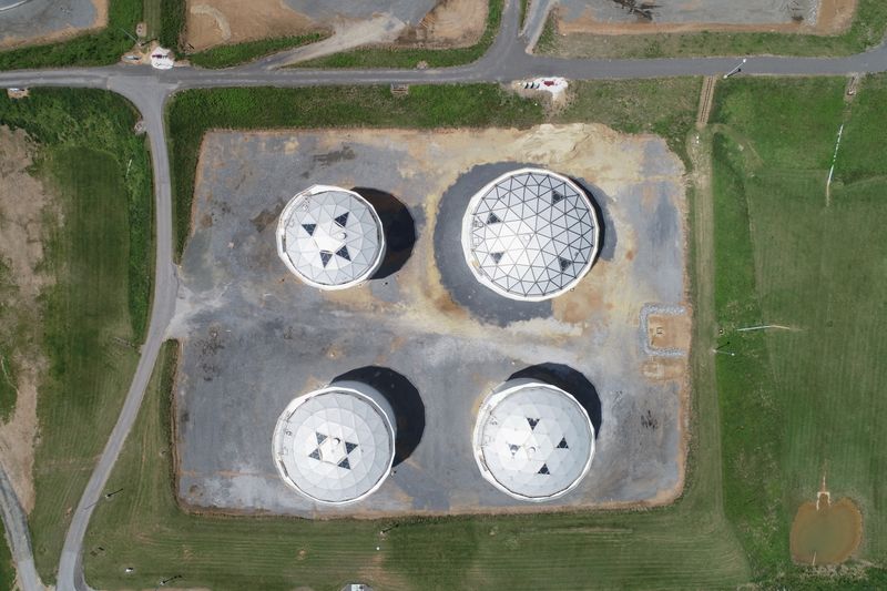 Holding tanks are seen in an aerial photograph at Colonial