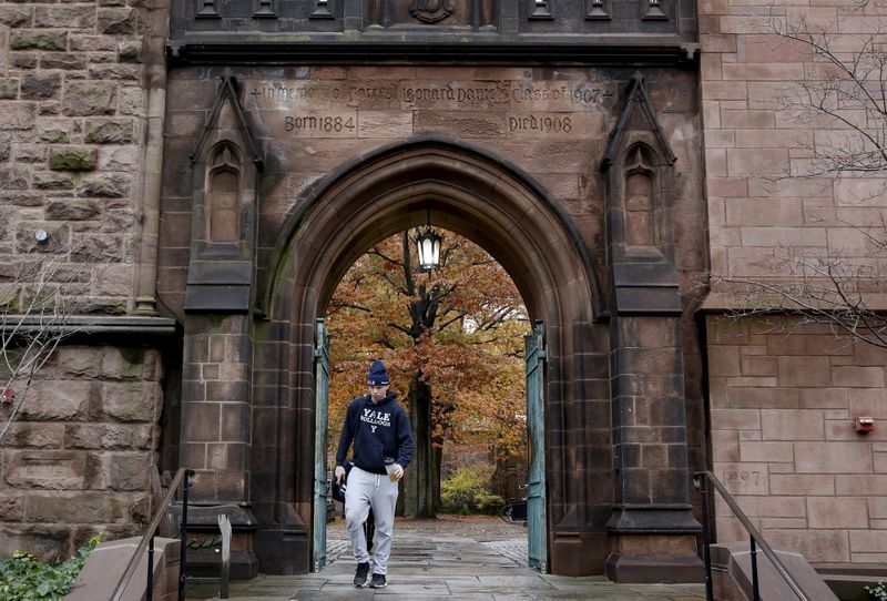 FILE PHOTO: Student walks on the campus of Yale University