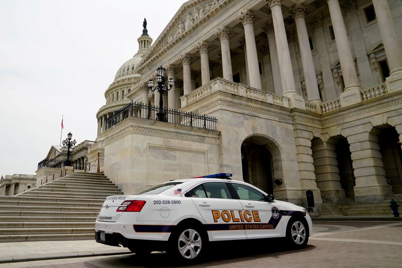 FILE PHOTO: A Capitol Police vehicle parks at the U.S.