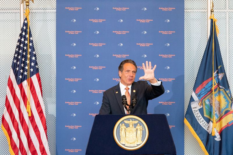FILE PHOTO: New York Governor Andrew Cuomo signs the bill