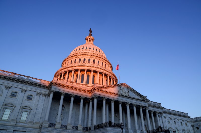 FILE PHOTO: The sun rises on the U.S. Capitol dome