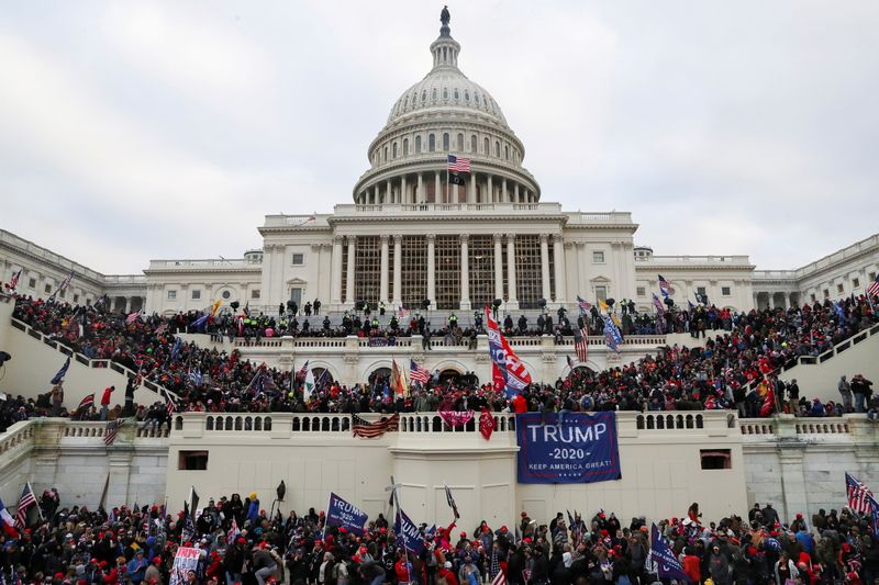 FILE PHOTO: Supporters of U.S. President Donald Trump gather in