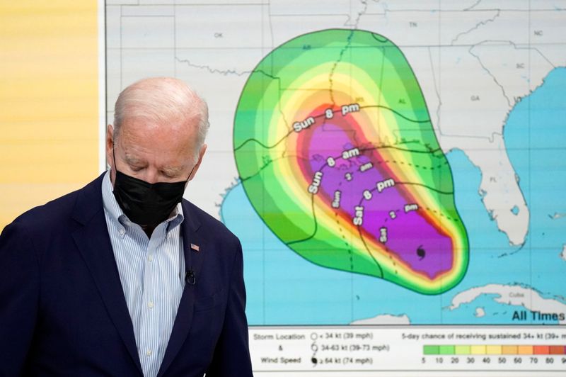U.S. President Joe Biden arrives for a virtual briefing with