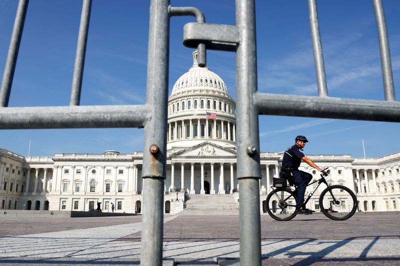 A U.S. Capitol Police officer patrols the east front of