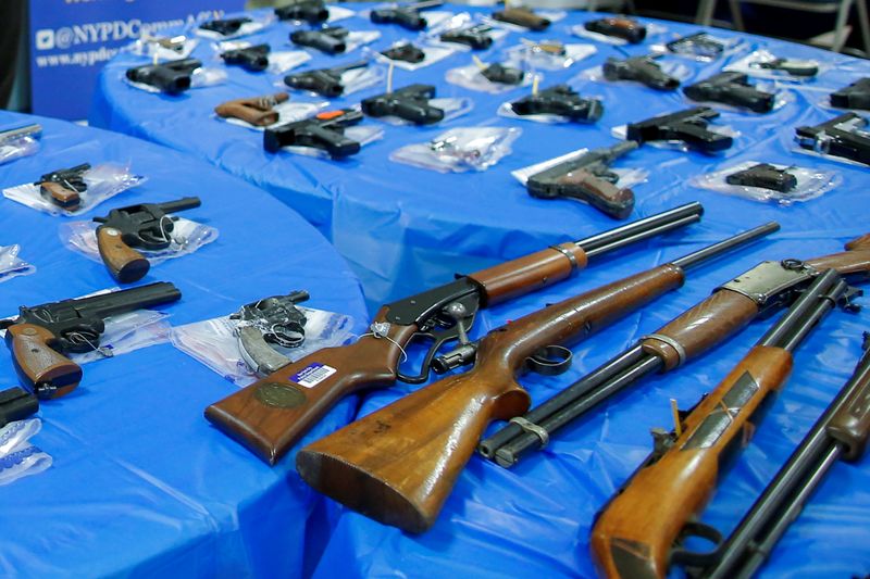 FILE PHOTO: Guns are displayed after a gun buyback event