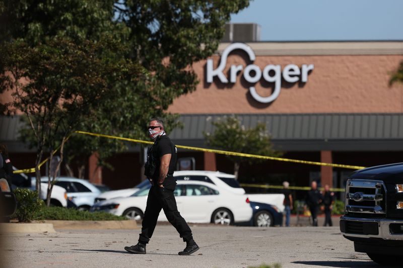Emergency personnel respond to a shooting at a Kroger supermarket