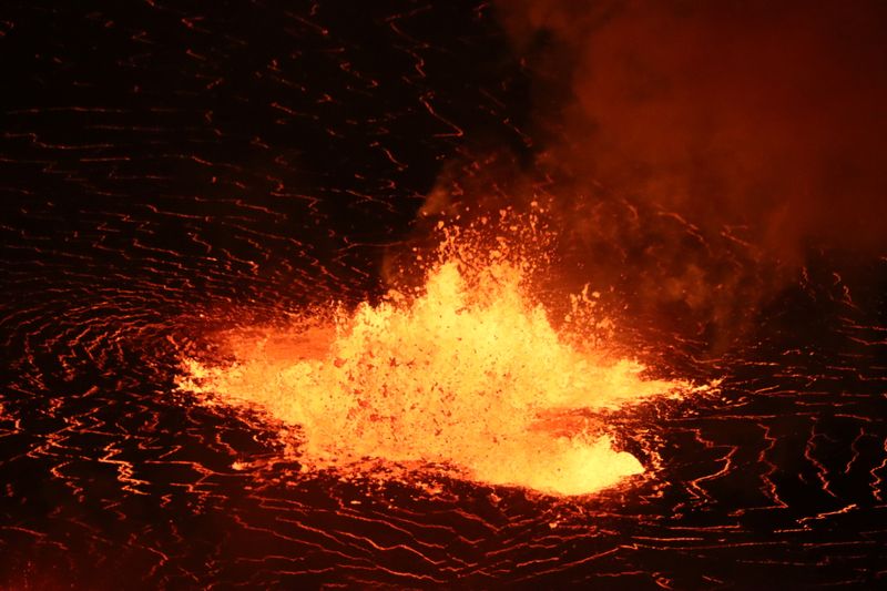 A rising lava lake is seen within Halema’uma’u crater during
