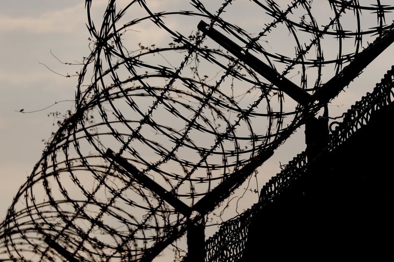 FILE PHOTO: Chain link fence and concertina wire seen at