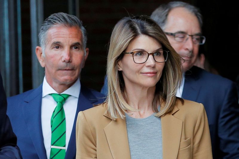FILE PHOTO: Actor Lori Loughlin and her husband Mossimo Giannulli