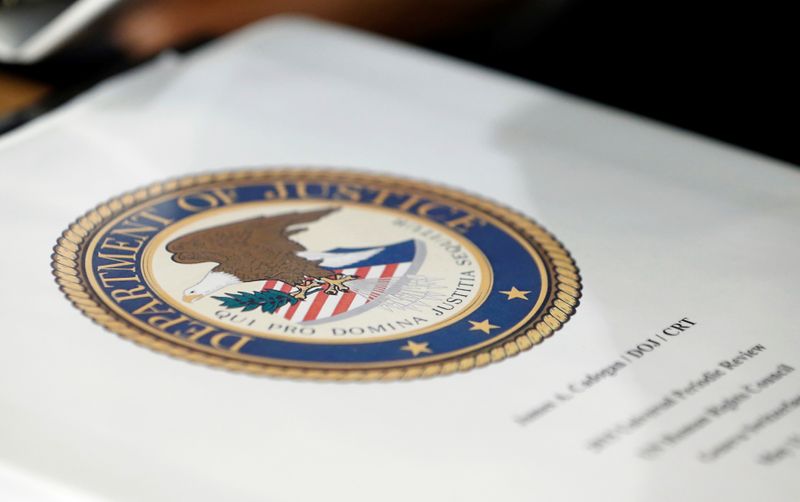 FILE PHOTO: Folder with the seal of the U.S. Department