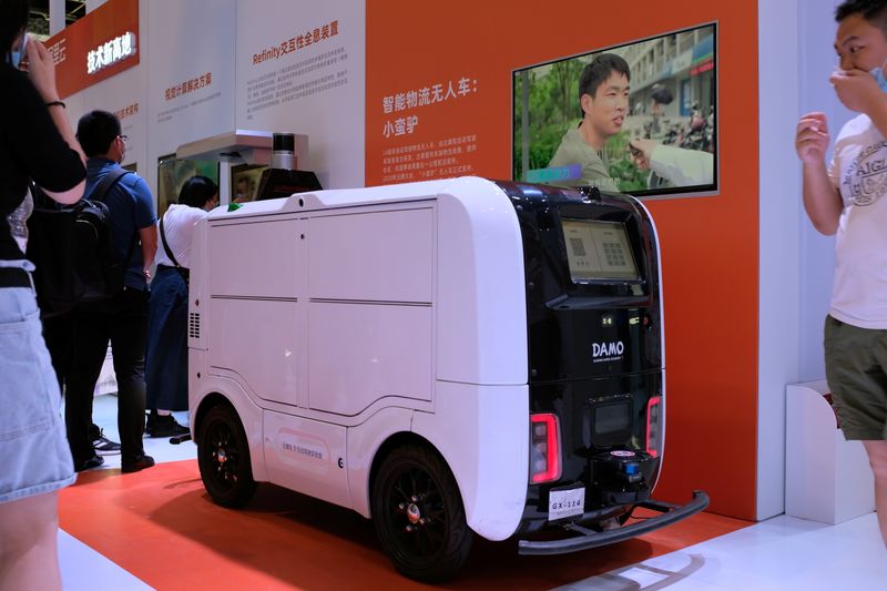 Autonomous delivery vehicle by Damo is displayed at the World