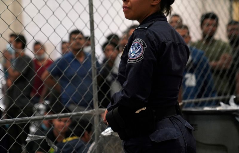 FILE PHOTO: A U.S. Customs and Border Protection agent monitors