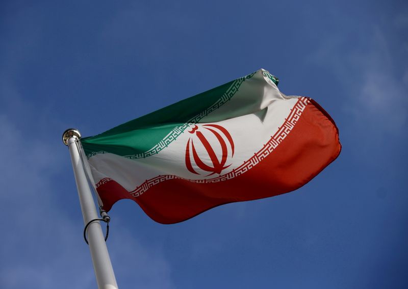 FILE PHOTO: FILE PHOTO: The Iranian flag waves in front