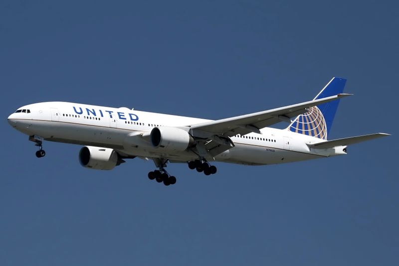 FILE PHOTO: A United Airlines Boeing 777 lands at San