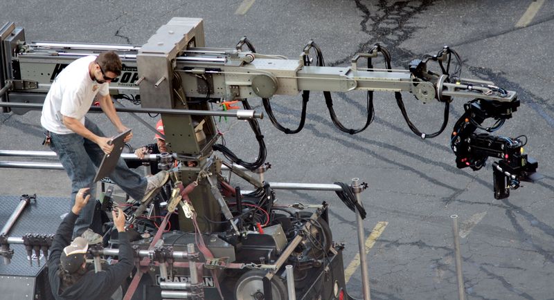 FILE PHOTO: A film crew dismantling equipment at an on-location