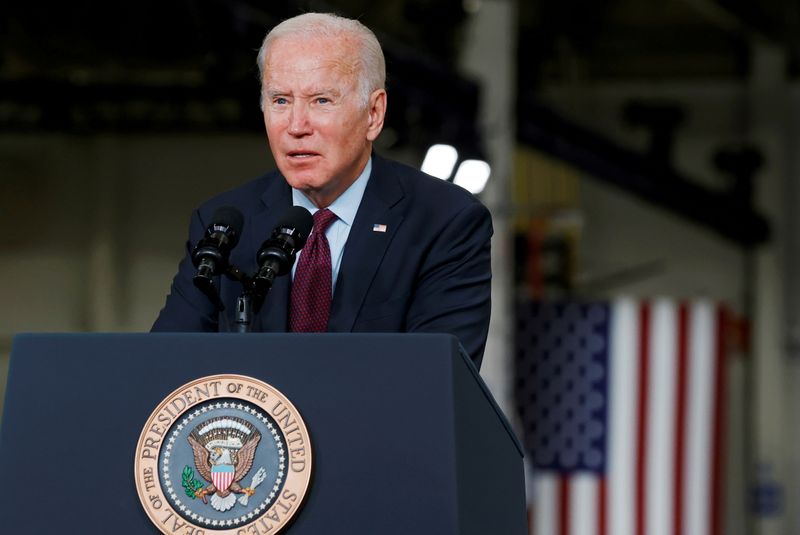 FILE PHOTO: U.S. President Joe Biden delivers remarks after touring