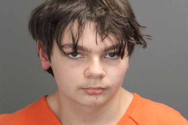 Ethan Crumbley poses in a jail booking photograph taken at
