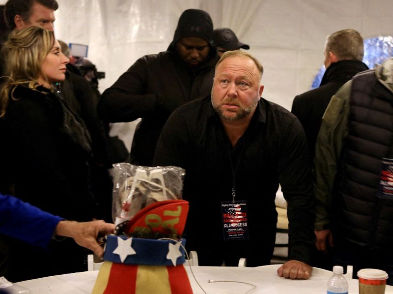FILE PHOTO: Alex Jones attends a rally at Freedom Plaza