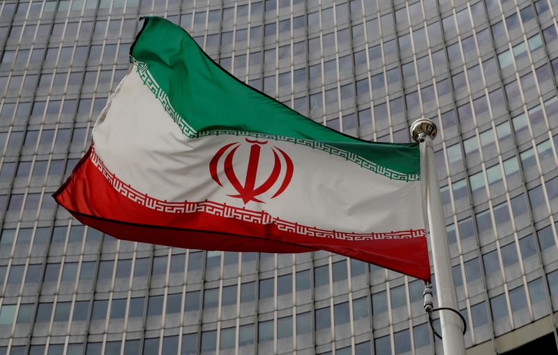 FILE PHOTO: An Iranian flag flutters in front of the
