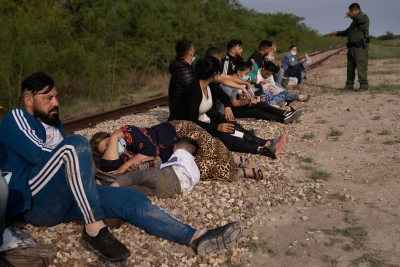 FILE PHOTO: Asylum-seeking migrants in La Joya, Texas