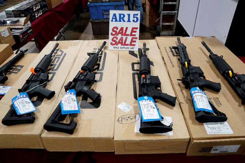 FILE PHOTO: AR-15 rifles are displayed for sale at the