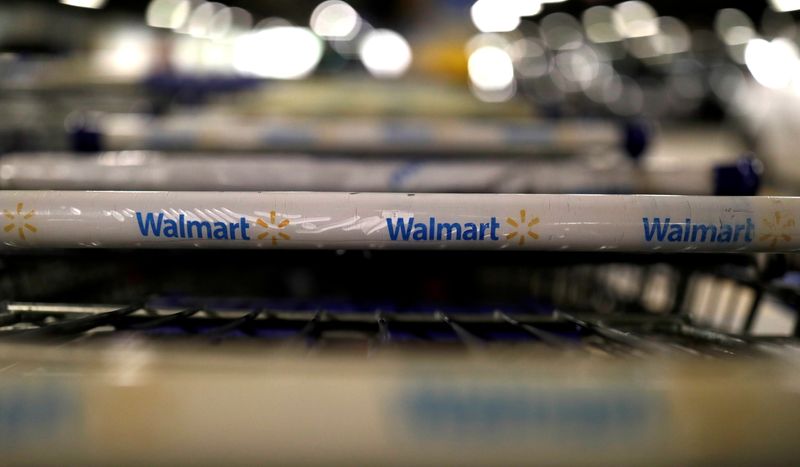 FILE PHOTO: The logo of Walmart is seen on shopping