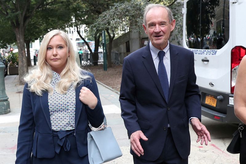 FILE PHOTO: Lawyer David Boies arrives with his client Virginia