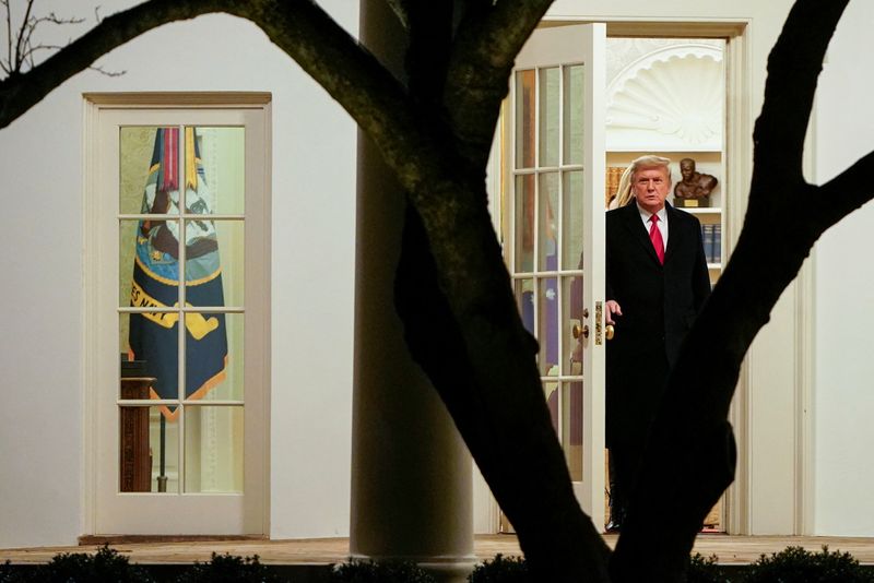U.S. President Donald Trump walks to Marine One as he