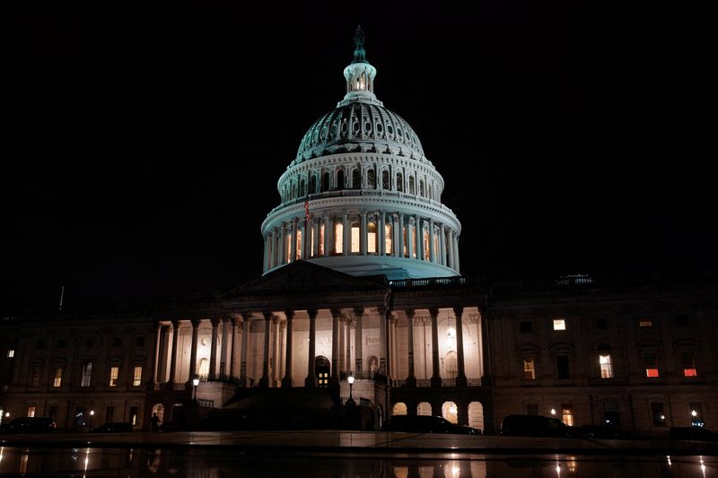 The U.S. Capitol dome is seen at night as the